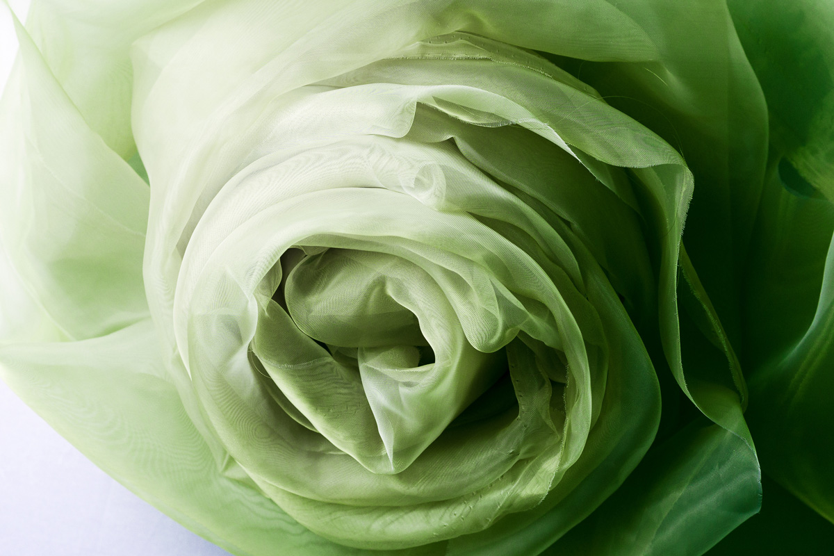 What kind of fabric is organza features and uses Cimmino